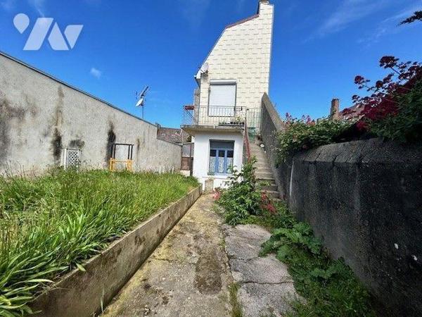 Appartement en rez-de-jardin dans petite copropriété avec syndic bénévole proche du centre et d...