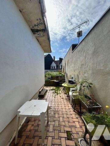 Appartement en rez-de-jardin dans petite copropriété avec syndic bénévole proche du centre et d...