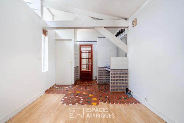 Duplex lumineux sous verrière à la lisière de Paris