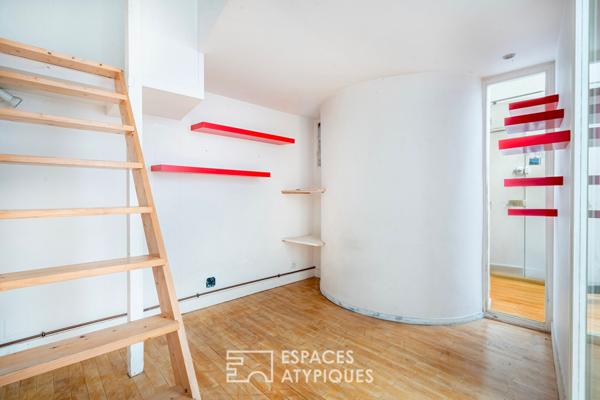Duplex lumineux sous verrière à la lisière de Paris