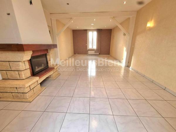 Maison mitoyenne d'un coté de 120 m2 avec garage et terrain