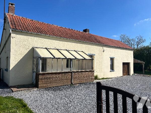 Maison individuelle avec garage et terrain