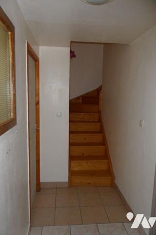 Maison individuelle avec garage et terrain