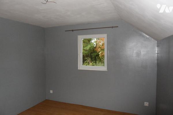 Maison individuelle avec garage et terrain