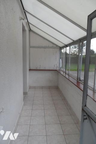 Maison individuelle avec garage et terrain