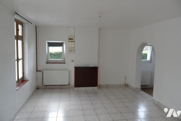 Maison individuelle avec garage et terrain