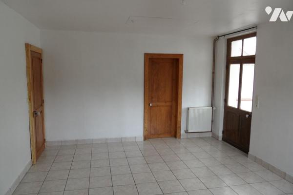 Maison individuelle avec garage et terrain