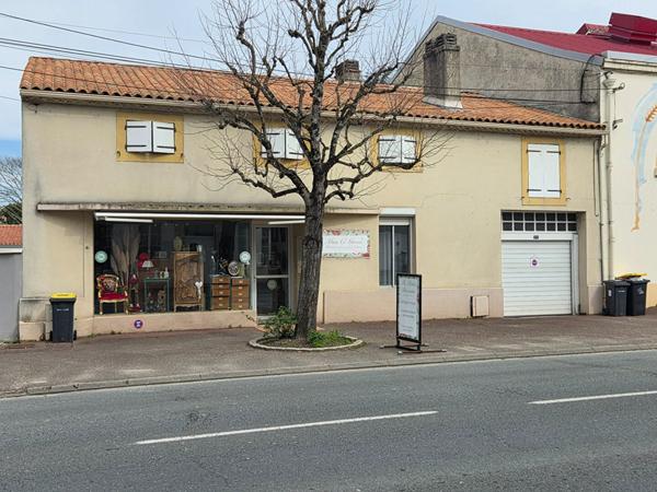 Maison de ville avec local commercial