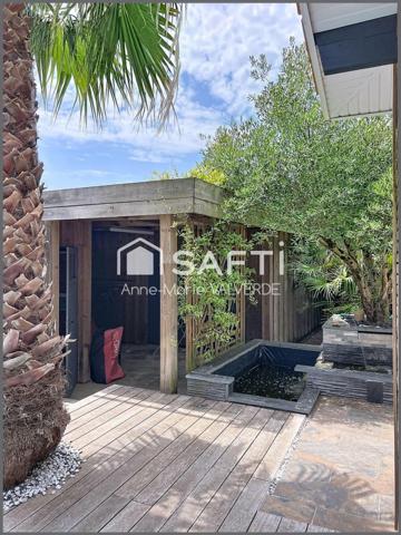 LACANAU VILLE– 170 m² – PISCINE CHAUFFÉE – GARAGE – TERRAIN DE 941 m²