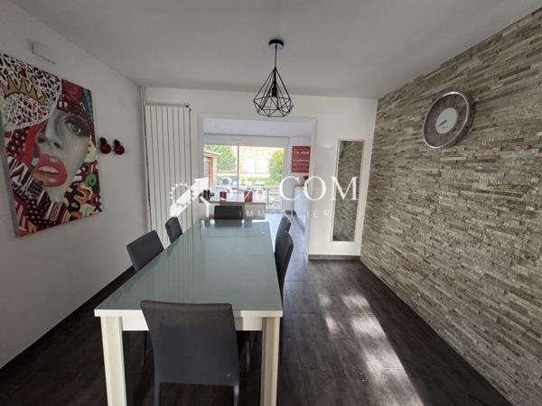 Maison 7 pièce(s) 3 chambre(s) 107 m²