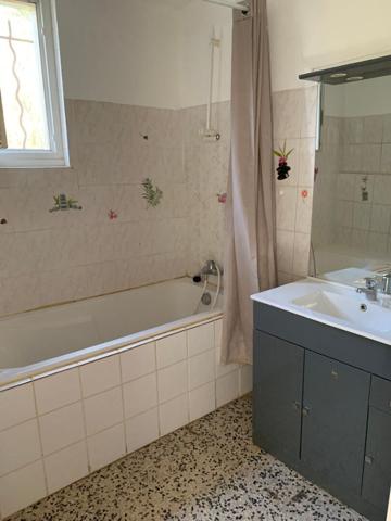 Appartement T3 en RDC avec terrasse privative, GARAGE + 1 place de parking -