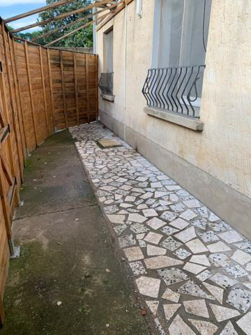 Appartement T3 en RDC avec terrasse privative, GARAGE + 1 place de parking -