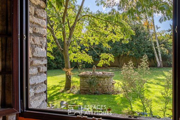 Demeure familiale aux volumes généreux, multiples possibilités dans un cadre préservé à Beynes