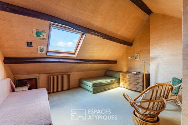 Demeure familiale aux volumes généreux, multiples possibilités dans un cadre préservé à Beynes