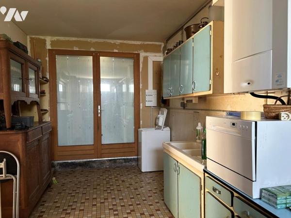 COUERON - LA CHABOSSIERE Maison construite en 1971 sur un terrain de 345 m²