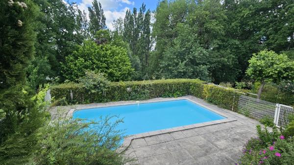 Charmant pavillon de 122m² + 1 appartement de 25m² + un sous sol total