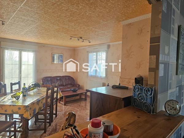 Maison de plain-pied 110 m2 avec deux garages et grand terrain