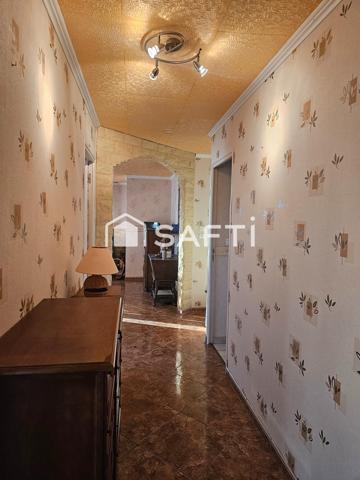 Maison de plain-pied 110 m2 avec deux garages et grand terrain