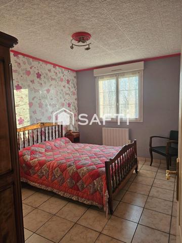 Maison de plain-pied 110 m2 avec deux garages et grand terrain