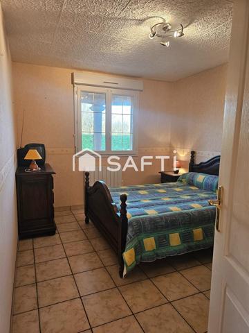 Maison de plain-pied 110 m2 avec deux garages et grand terrain