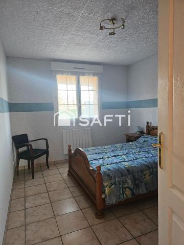 Maison de plain-pied 110 m2 avec deux garages et grand terrain