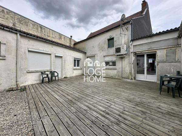 Immeuble a usage mixte avec fort potentiel de rentabilite garage + exterieurs