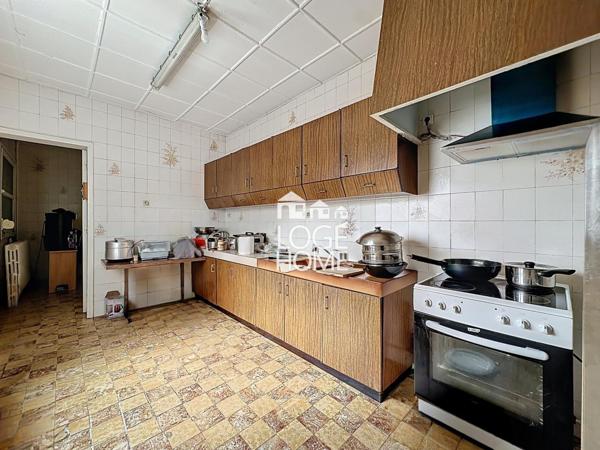 Immeuble a usage mixte avec fort potentiel de rentabilite garage + exterieurs