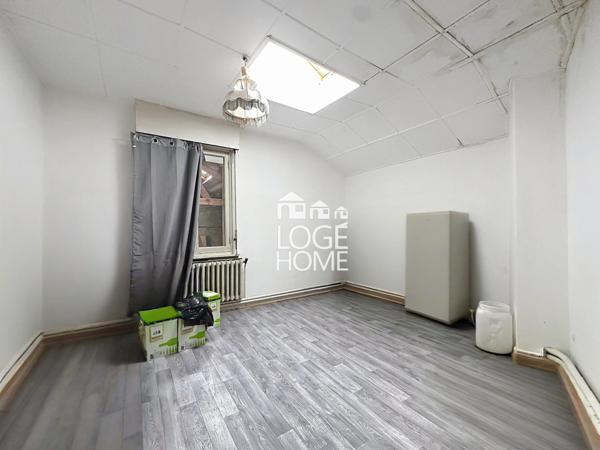 Immeuble a usage mixte avec fort potentiel de rentabilite garage + exterieurs