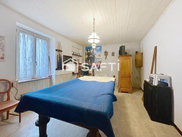 Grande maison de village avec garage et jardin