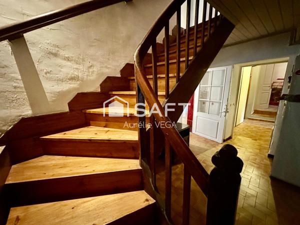 Grande maison de village avec garage et jardin