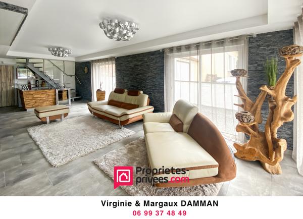 Maison moderne avec espace de vie ouvert et 3 chambres