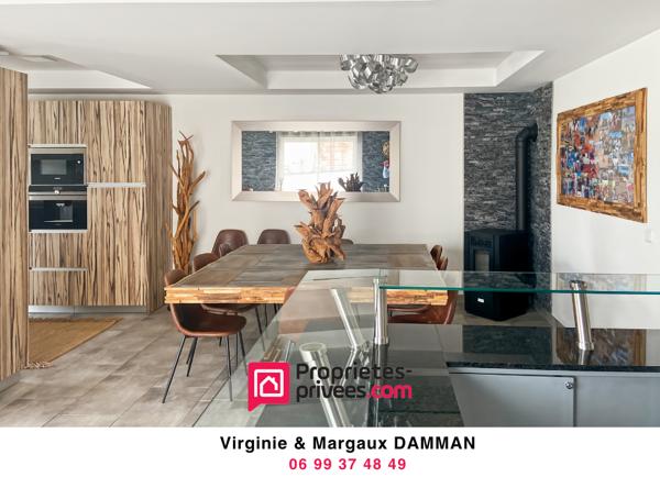 Maison moderne avec espace de vie ouvert et 3 chambres