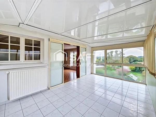 MAISON SUR SOUS-SOL AVEC ASCENSEUR ET VÉRANDA CHAUFFÉE