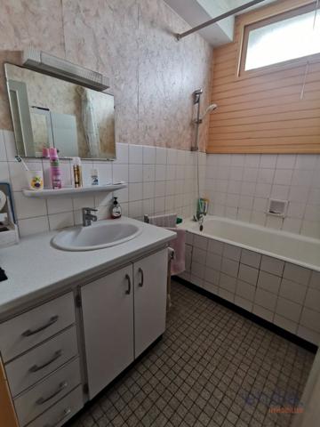Appartement loué Spacieux de 77 m² à Navenne avec Vue Dégagée, balcon, garage et ascenseur