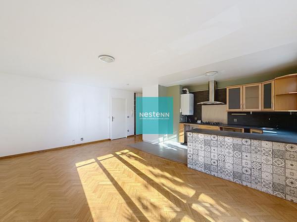 Appartement 70 m² avec box et stationnement - Belle pièce de vie de 35 m² au Plessis Bouchard