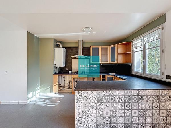 Appartement 70 m² avec box et stationnement - Belle pièce de vie de 35 m² au Plessis Bouchard