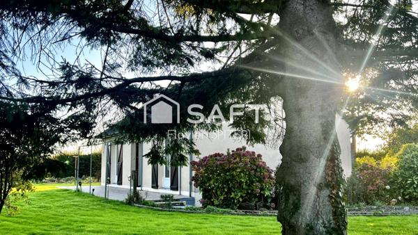 Maison de plain-pied 76 m² avec jardin paysagé