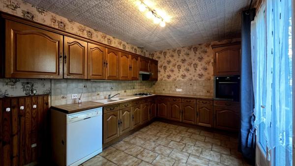 Maison de plain-pied 76 m² avec jardin paysagé