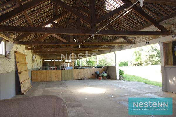 Maison de 4 chambres à vendre à Saint Brandan, accès commerces de QUINTIN à pieds, grand hangar de 550 m², sur  environ 7500 m² de terrain