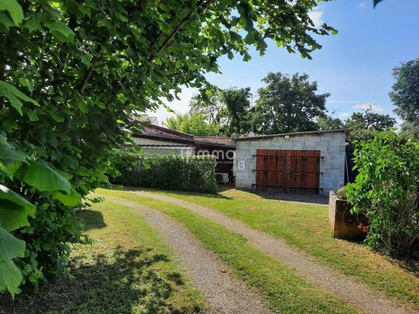 Maison lumineuse aux volumes généreux dans un écrin de verdure