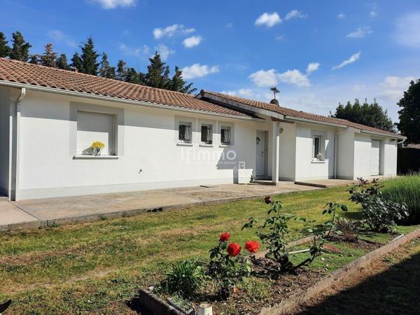 Maison lumineuse aux volumes généreux dans un écrin de verdure