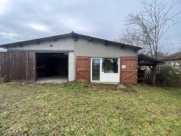 ENTREPÔT AVEC TERRAIN CONSTRUCTIBLE EN ZONE ARTISANALE – CESSIEU (38110)