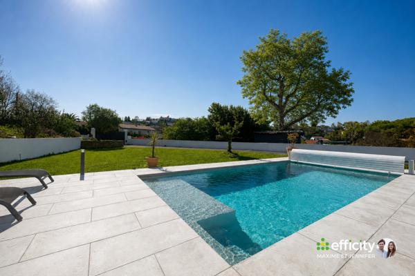 Maison
         6 pièces
        - 190 m² 829 900 € *