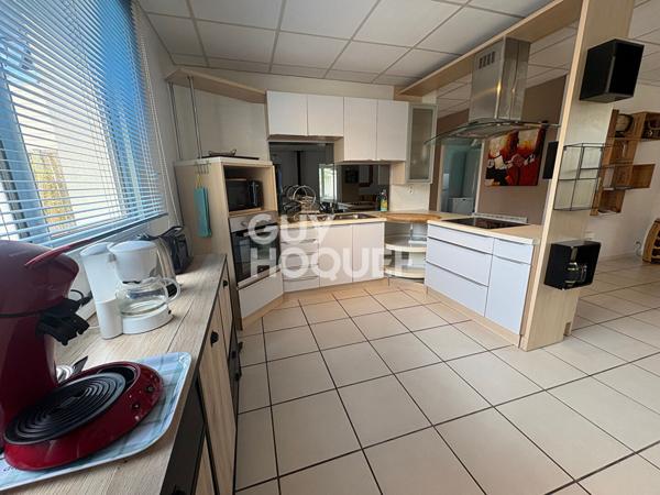 Maison d'environ 100 m² avec terrasse et jardinet