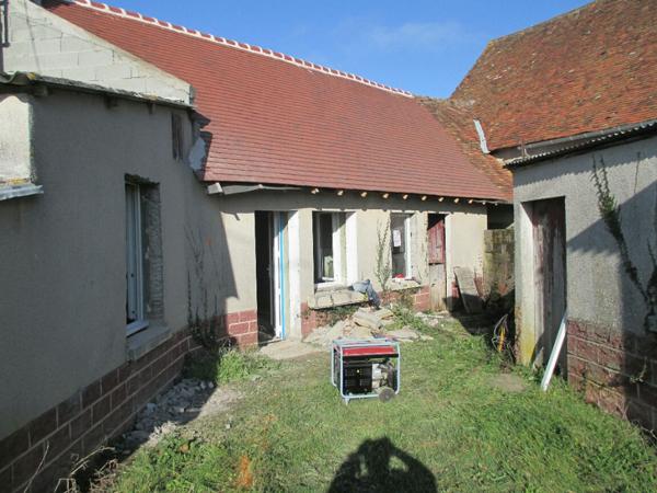 Maison à rénover avec jardin et dépendances