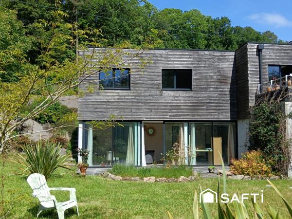 Moderne, éco-performante, terrain 3000 m² arboré