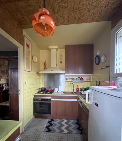 Maison des années 60 avec jardin et double garage