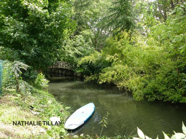 OLIVET bord du Loiret, a vendre, jolie maison de 243 m², jardin paysagé et arboré, parcelle de 1 123,00 m²