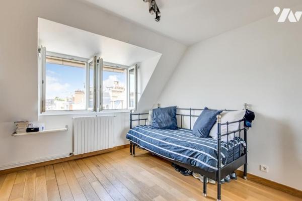 Commerce – Appartement familial en dernier étage avec balcon