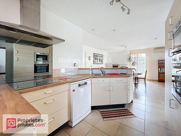 Maison plain pied  5 pièces 114 m2, double garage et jardin